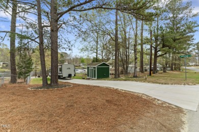 Introducing your new slice of paradise! Welcome to the on River Golf and County Club at Lake Royale in North Carolina - for sale on GolfHomes.com, golf home, golf lot