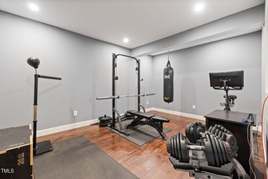 Welcome to 7632 Summer Pines Way in the exclusive Hasentree on Hasentree Club in North Carolina - for sale on GolfHomes.com, golf home, golf lot