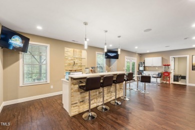 Welcome to 7632 Summer Pines Way in the exclusive Hasentree on Hasentree Club in North Carolina - for sale on GolfHomes.com, golf home, golf lot