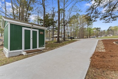 Introducing your new slice of paradise! Welcome to the on River Golf and County Club at Lake Royale in North Carolina - for sale on GolfHomes.com, golf home, golf lot