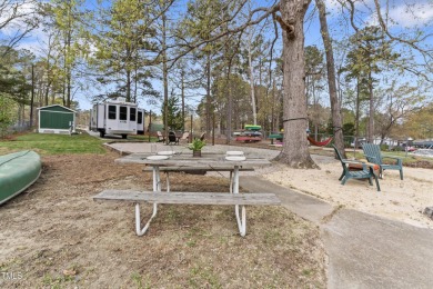 Introducing your new slice of paradise! Welcome to the on River Golf and County Club at Lake Royale in North Carolina - for sale on GolfHomes.com, golf home, golf lot