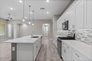 Experience luxury living in this impeccable 2-bedroom PLUS DEN on Tuscany Falls At Pebble Creek in Arizona - for sale on GolfHomes.com, golf home, golf lot