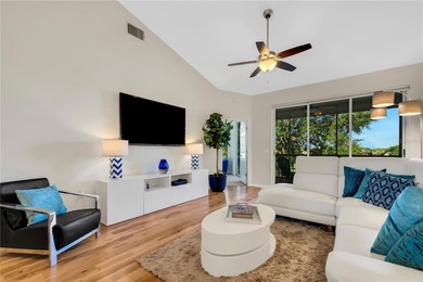 TURN-KEY FURNISHED CONDO . . . Simply bring your clothes & a on Grasslands Golf and Country Club in Florida - for sale on GolfHomes.com, golf home, golf lot