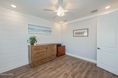 FULLY FURNISHED TURNKEY HOME WITH RELAXING COVERED OUTDOOR SPACE on Sharks Tooth Golf Club in Florida - for sale on GolfHomes.com, golf home, golf lot