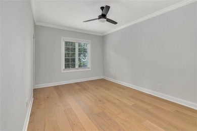 This condo faces a spectacular view of Butler Lake and the King on The King and Prince Golf Course, Home of the Hampton Club in Georgia - for sale on GolfHomes.com, golf home, golf lot