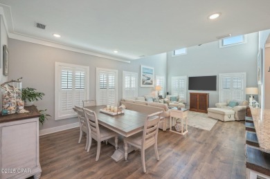 FULLY FURNISHED TURNKEY HOME WITH RELAXING COVERED OUTDOOR SPACE on Sharks Tooth Golf Club in Florida - for sale on GolfHomes.com, golf home, golf lot