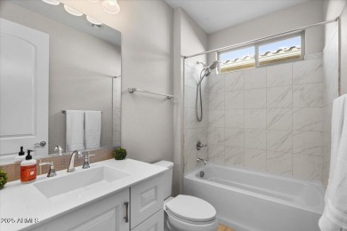 Experience luxury living in this impeccable 2-bedroom PLUS DEN on Tuscany Falls At Pebble Creek in Arizona - for sale on GolfHomes.com, golf home, golf lot