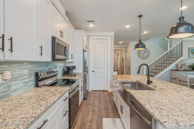 FULLY FURNISHED TURNKEY HOME WITH RELAXING COVERED OUTDOOR SPACE on Sharks Tooth Golf Club in Florida - for sale on GolfHomes.com, golf home, golf lot