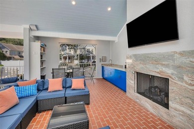 This condo faces a spectacular view of Butler Lake and the King on The King and Prince Golf Course, Home of the Hampton Club in Georgia - for sale on GolfHomes.com, golf home, golf lot