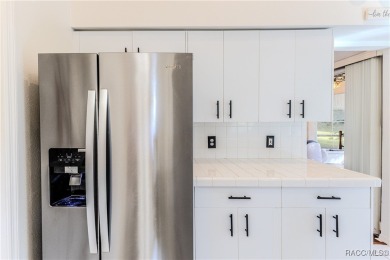 Welcome to this stunning, Magnolia model, end-unit villa on Timber Pines Golf Course in Florida - for sale on GolfHomes.com, golf home, golf lot