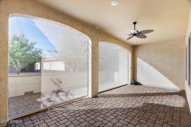 Experience luxury living in this impeccable 2-bedroom PLUS DEN on Tuscany Falls At Pebble Creek in Arizona - for sale on GolfHomes.com, golf home, golf lot