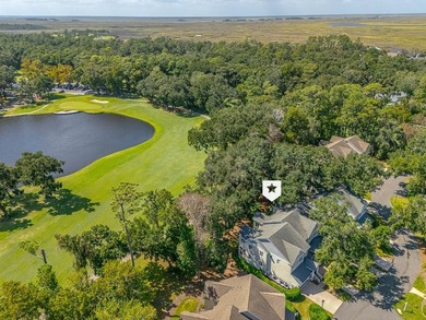 This condo faces a spectacular view of Butler Lake and the King on The King and Prince Golf Course, Home of the Hampton Club in Georgia - for sale on GolfHomes.com, golf home, golf lot