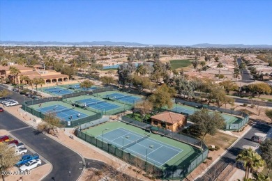 Experience luxury living in this impeccable 2-bedroom PLUS DEN on Tuscany Falls At Pebble Creek in Arizona - for sale on GolfHomes.com, golf home, golf lot