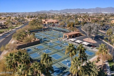 Experience luxury living in this impeccable 2-bedroom PLUS DEN on Tuscany Falls At Pebble Creek in Arizona - for sale on GolfHomes.com, golf home, golf lot
