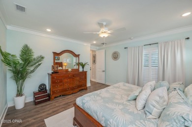 FULLY FURNISHED TURNKEY HOME WITH RELAXING COVERED OUTDOOR SPACE on Sharks Tooth Golf Club in Florida - for sale on GolfHomes.com, golf home, golf lot