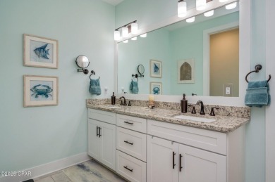 FULLY FURNISHED TURNKEY HOME WITH RELAXING COVERED OUTDOOR SPACE on Sharks Tooth Golf Club in Florida - for sale on GolfHomes.com, golf home, golf lot