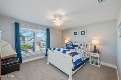 FULLY FURNISHED TURNKEY HOME WITH RELAXING COVERED OUTDOOR SPACE on Sharks Tooth Golf Club in Florida - for sale on GolfHomes.com, golf home, golf lot