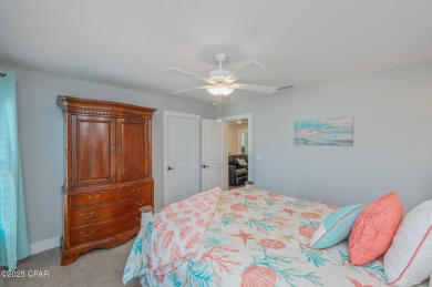 FULLY FURNISHED TURNKEY HOME WITH RELAXING COVERED OUTDOOR SPACE on Sharks Tooth Golf Club in Florida - for sale on GolfHomes.com, golf home, golf lot