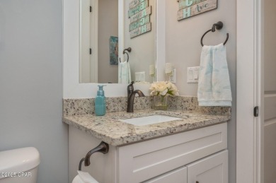 FULLY FURNISHED TURNKEY HOME WITH RELAXING COVERED OUTDOOR SPACE on Sharks Tooth Golf Club in Florida - for sale on GolfHomes.com, golf home, golf lot