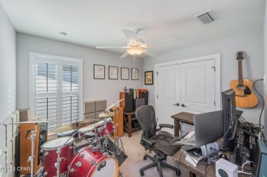 FULLY FURNISHED TURNKEY HOME WITH RELAXING COVERED OUTDOOR SPACE on Sharks Tooth Golf Club in Florida - for sale on GolfHomes.com, golf home, golf lot