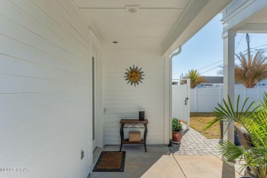 FULLY FURNISHED TURNKEY HOME WITH RELAXING COVERED OUTDOOR SPACE on Sharks Tooth Golf Club in Florida - for sale on GolfHomes.com, golf home, golf lot