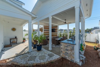 FULLY FURNISHED TURNKEY HOME WITH RELAXING COVERED OUTDOOR SPACE on Sharks Tooth Golf Club in Florida - for sale on GolfHomes.com, golf home, golf lot
