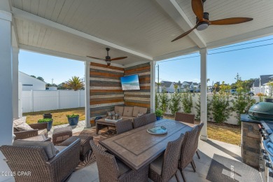 FULLY FURNISHED TURNKEY HOME WITH RELAXING COVERED OUTDOOR SPACE on Sharks Tooth Golf Club in Florida - for sale on GolfHomes.com, golf home, golf lot