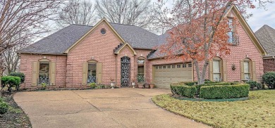 Nestled in a gated community, this stunning home offers on Cordova Country Club in Tennessee - for sale on GolfHomes.com, golf home, golf lot