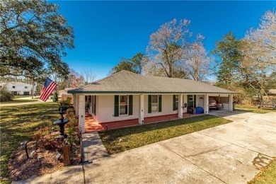 Beautifully renovated 3-bed, 2-bath brick home featuring a 2019 on Pinewood Country Club in Louisiana - for sale on GolfHomes.com, golf home, golf lot