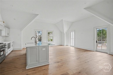 An elegant new construction carriage house offering refined on The Ford Field and River Club  in Georgia - for sale on GolfHomes.com, golf home, golf lot