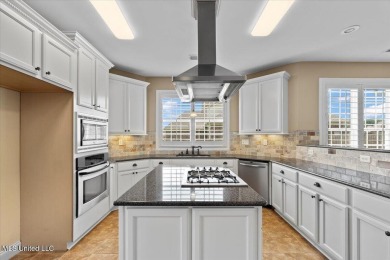Welcome to this exquisite 3,500 sq ft residence nestled in the on Wedgewood Golfers Club in Mississippi - for sale on GolfHomes.com, golf home, golf lot