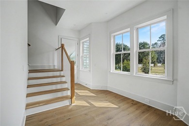 An elegant new construction carriage house offering refined on The Ford Field and River Club  in Georgia - for sale on GolfHomes.com, golf home, golf lot