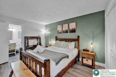 Escape. Earn. Enjoy. This end-unit townhome filled with modern on Jack Frost National Golf Course in Pennsylvania - for sale on GolfHomes.com, golf home, golf lot