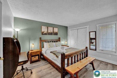 Escape. Earn. Enjoy. This end-unit townhome filled with modern on Jack Frost National Golf Course in Pennsylvania - for sale on GolfHomes.com, golf home, golf lot
