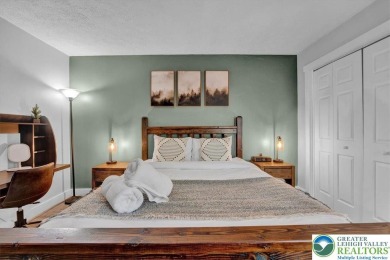 Escape. Earn. Enjoy. This end-unit townhome filled with modern on Jack Frost National Golf Course in Pennsylvania - for sale on GolfHomes.com, golf home, golf lot