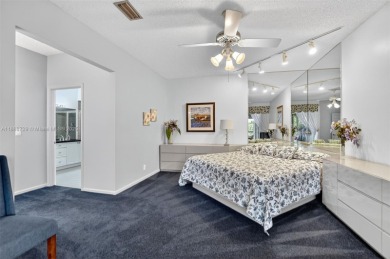 Lovely 2 bedroom, 2 bath Cayman model on the second floor on Boca Pointe Country Club in Florida - for sale on GolfHomes.com, golf home, golf lot