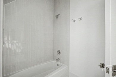 An elegant new construction carriage house offering refined on The Ford Field and River Club  in Georgia - for sale on GolfHomes.com, golf home, golf lot