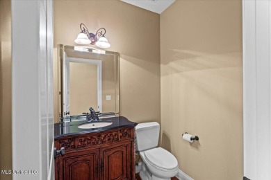 Welcome to this exquisite 3,500 sq ft residence nestled in the on Wedgewood Golfers Club in Mississippi - for sale on GolfHomes.com, golf home, golf lot