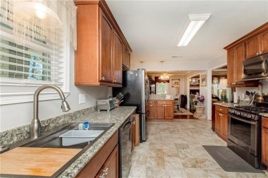 Beautifully renovated 3-bed, 2-bath brick home featuring a 2019 on Pinewood Country Club in Louisiana - for sale on GolfHomes.com, golf home, golf lot