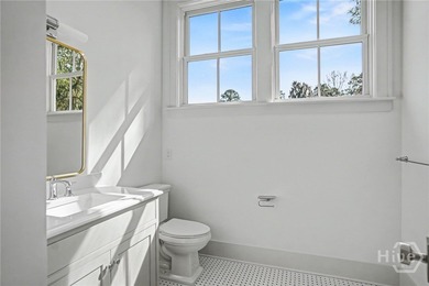 An elegant new construction carriage house offering refined on The Ford Field and River Club  in Georgia - for sale on GolfHomes.com, golf home, golf lot