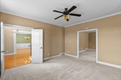 Welcome to this exquisite 3,500 sq ft residence nestled in the on Wedgewood Golfers Club in Mississippi - for sale on GolfHomes.com, golf home, golf lot