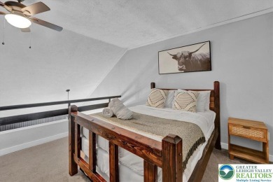 Escape. Earn. Enjoy. This end-unit townhome filled with modern on Jack Frost National Golf Course in Pennsylvania - for sale on GolfHomes.com, golf home, golf lot