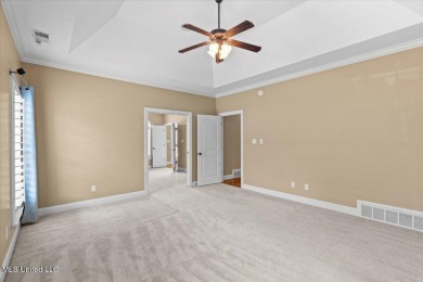Welcome to this exquisite 3,500 sq ft residence nestled in the on Wedgewood Golfers Club in Mississippi - for sale on GolfHomes.com, golf home, golf lot