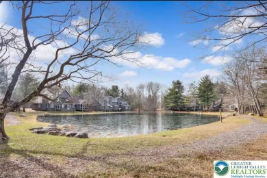 Escape. Earn. Enjoy. This end-unit townhome filled with modern on Jack Frost National Golf Course in Pennsylvania - for sale on GolfHomes.com, golf home, golf lot