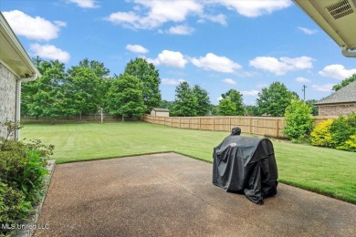 Welcome to this exquisite 3,500 sq ft residence nestled in the on Wedgewood Golfers Club in Mississippi - for sale on GolfHomes.com, golf home, golf lot