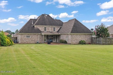 Welcome to this exquisite 3,500 sq ft residence nestled in the on Wedgewood Golfers Club in Mississippi - for sale on GolfHomes.com, golf home, golf lot