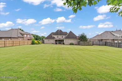 Welcome to this exquisite 3,500 sq ft residence nestled in the on Wedgewood Golfers Club in Mississippi - for sale on GolfHomes.com, golf home, golf lot