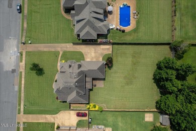 Welcome to this exquisite 3,500 sq ft residence nestled in the on Wedgewood Golfers Club in Mississippi - for sale on GolfHomes.com, golf home, golf lot