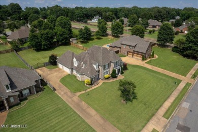 Welcome to this exquisite 3,500 sq ft residence nestled in the on Wedgewood Golfers Club in Mississippi - for sale on GolfHomes.com, golf home, golf lot