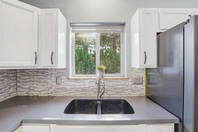 Listed by Lori Barnett, Engel & Volkers .   Nestled in the on Golf Club At Red Rock in South Dakota - for sale on GolfHomes.com, golf home, golf lot